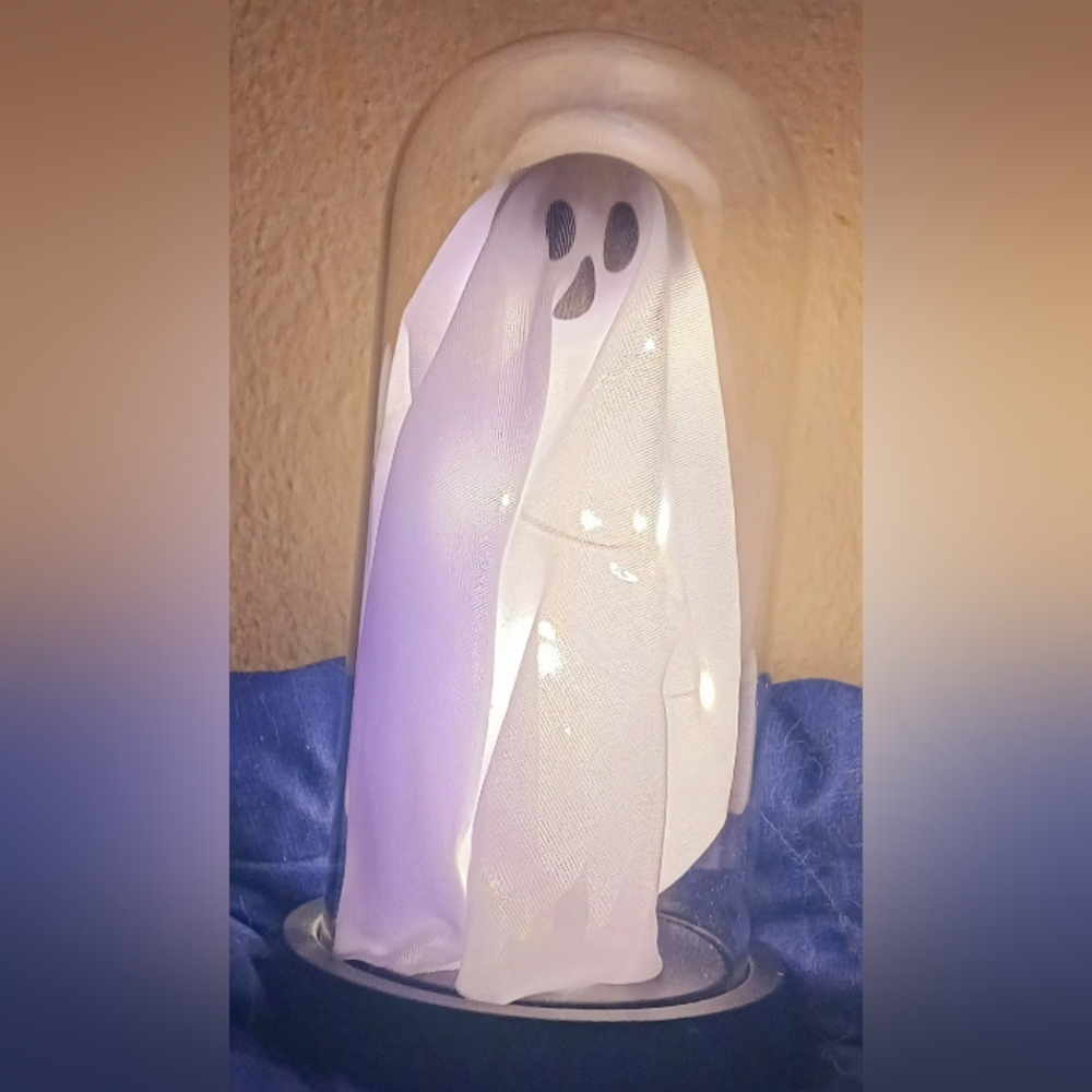 White Halloween Ghost Light Under A Glass Dome